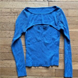 Blue sweater with cut out at the top.